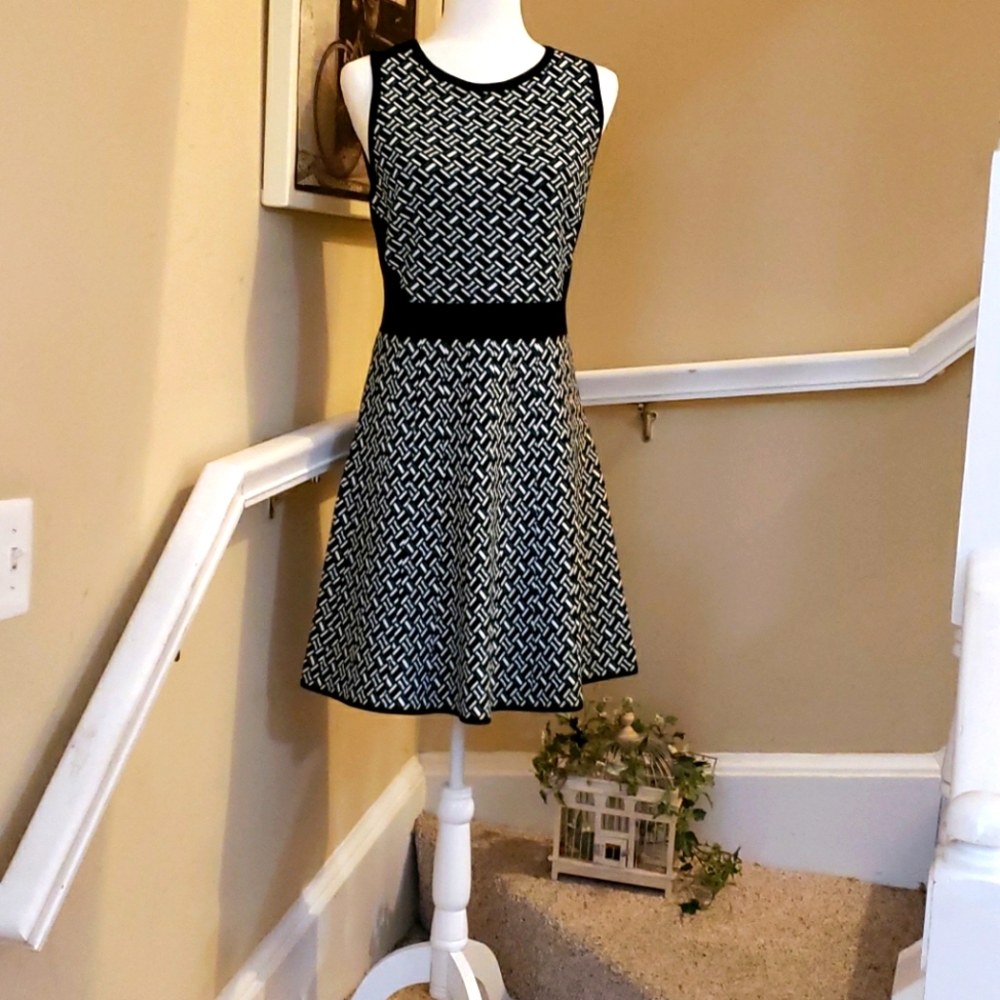 If medium is a fit try this sleeveless dress